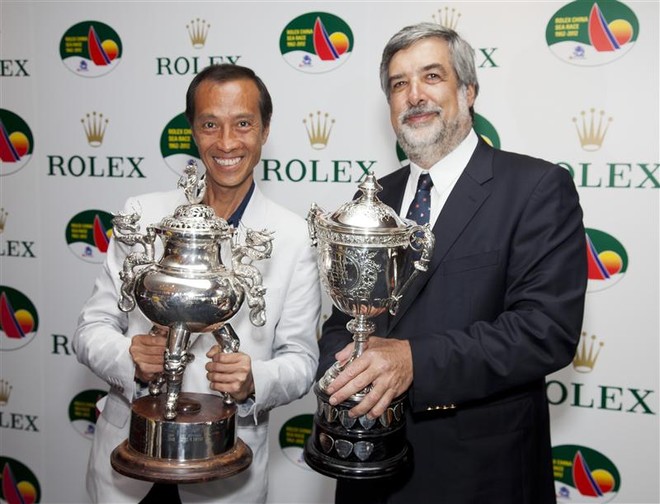 Ambrose Lo, Commodore of the Royal Hong Kong Yacht Club with Richard Strompf, Chairman of the Rolex China Sea Race committee with the Rolex China Sea Race trophy - Rolex China Sea Race 2012 ©  Rolex/Daniel Forster http://www.regattanews.com
